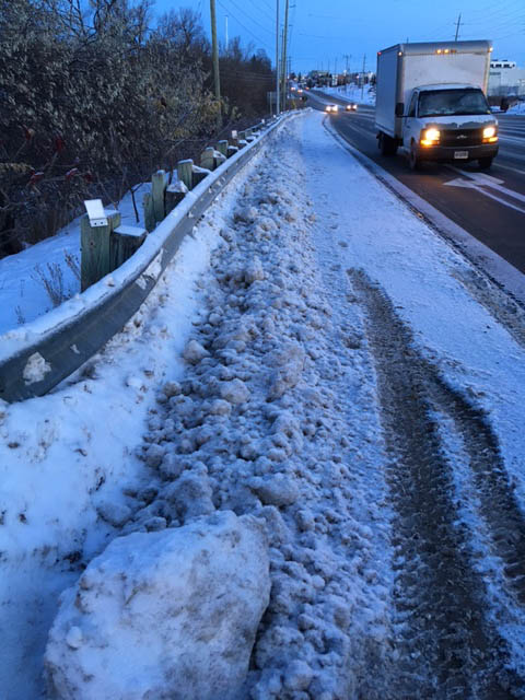 Sidewalk with snow coverings