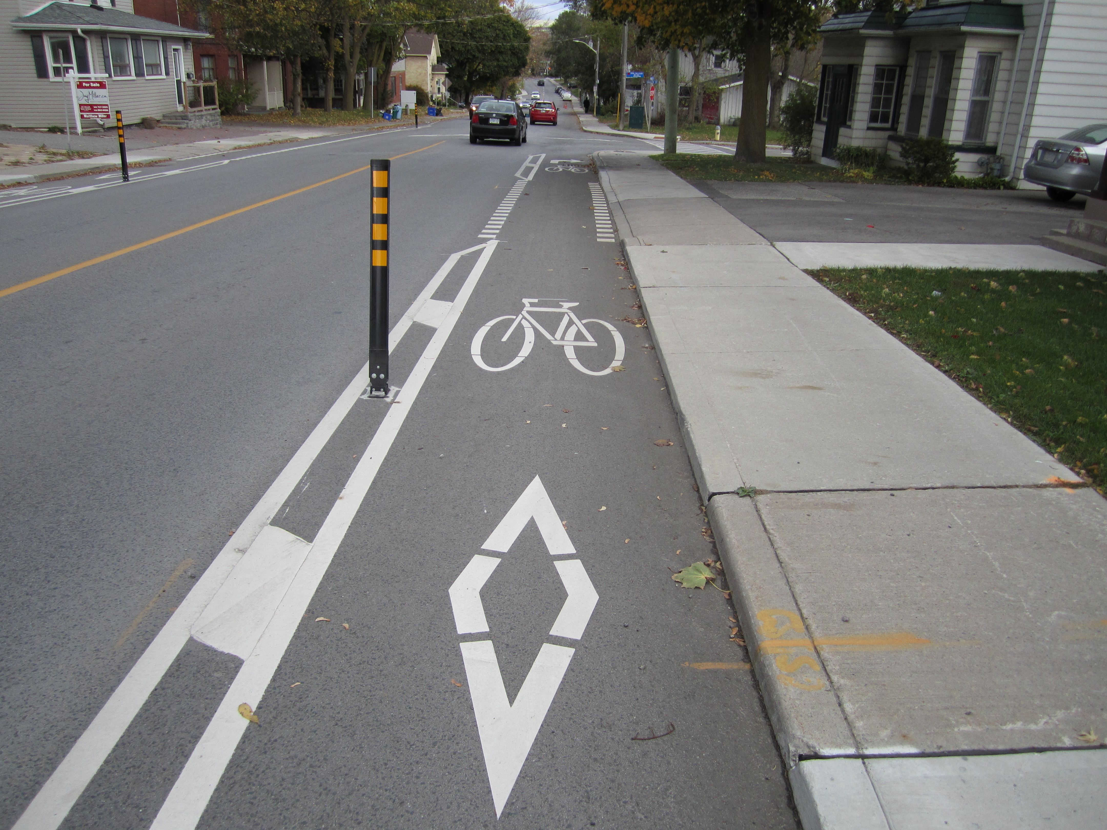 a picture showing a bicycle and diamond symbol on Prospect Street